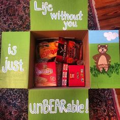 an open box filled with food on top of a carpet next to other boxes that say life without you is just unbearable