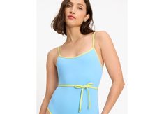 Make a bold beachside statement in this color blocked one-piece; it comes with a belt to cinch in your waist. | Kate Spade Colorblock Belted One-Piece, Spring Water - Large Blue Summer Swimwear With Tie Waist, Blue Tie Waist Summer Swimwear, Blue Tie Waist Swimwear For Summer, One-piece Swimwear With Tie Waist For Beach Season, One-piece Tie Waist Swimwear For Beach Season, Kate Spade Beachwear Swimwear For Spring, Kate Spade Swimwear For Pool In Spring, Kate Spade Summer Swimwear For Pool, Kate Spade Swimwear For Poolside And Beach Season