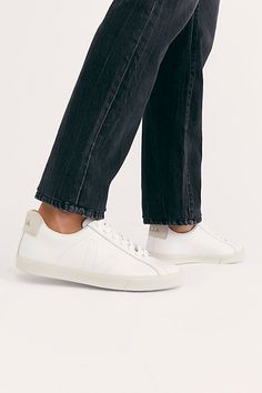 Made with sustainable materials, these retro style leather sneakers are featured in a low-top design with suede details and a tonal logo on the side. * Padded collar and footbed * Lace-up front | Veja Esplar Sneakers at Free People in White, Size: EU 39 Veja Esplar Sneakers, Shoes Veja, Veja Esplar, Veja Shoes, Espadrille Sneakers, Metallic Sneakers, Veja Sneakers, Wardrobe Planning, Free People Store