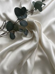 J.Sander Designer Brand Deadstock Fabric- Satin Crepe  This luxurious woven satin crepe fabric is simply exquisite! It has a glossy satin sheen and weighted with a density of 180.00g/m therefore making it ideal for bridal wear, evening gowns, blouses, jackets, soft furnishings and more... Composition: ACETATE 71%, VISCOSE 29% Density: 180.00 g/m² Width: 142.00 cm Purpose: Dress/Blouse Weaving: Satin Crepe Stretch: Non-stretch Color: Shades of white Colours are portrayed in a natural light but please be mindful of your own screen settings. If you require additional images and videos, please message us.  Sold in half, one metre and five metree quantities. Deadstock Fabric, Petal Confetti, Bridal Attire, Peace Illustration, Dress Blouse, Bamboo Silk, Shades Of White, Gorgeous Fabrics, Crepe Fabric