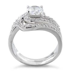 Top of ring height: 12.42mm

Band width: 6.5mm

Shank width: 4.4mm


Stone material: clear cubic zirconia

Center stone size: 6mm

Stone shape: round

Center stone carat weight: 0.8 ct.

Total number of CZ stones: 52

Stone setting: Prong setting


Metal: 925 sterling silver

Plating: rhodium plated

Finish: high polish Sterling Silver Engagement Rings, Set Ring, Stone Setting, Wedding Set, One Ring, Cz Stone, Wedding Ring Sets, Stone Settings, Sterling Ring