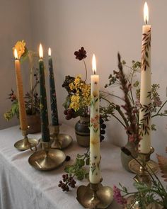 Hand painted taper dinner candles are hand painted with floral designs. They are in brass candle stick holders on a table surrounded by autumn flowers and foliage. Arte Aesthetic, Art Animation, Painted Candles, Art Animals, Animals Art, Art Idea, Arte Animal, Art Aesthetic, Art Anime