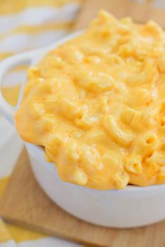 macaroni and cheese is in a white bowl