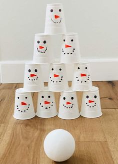 a group of cups that have been made to look like snowmen