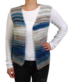 Batik Blue Hand Knit Women Sweater Vest Petrol Blue Cream Sleeveless Cardigan For Women Fashionably designed for women's pure-handknit-hand-knit-vests-sleeveless-sweaters. Hand-knit sweaters are breathable, outdoor durable, and temperature regulating. Made from a soft blend of wool and delivers, sustainable wearing & warmth indoor and outdoor. We are designing hand-knitted products that are meticulously and lovingly prepared by talented and senior knitters in pets & smoking-free, hygienic environments, using specially selected luxury wool yarns, that will make you feel warm and you will wear with pleasure. It's ideal all through the colder months. FREE SHIPPING FOR ALL ORDERS  All items are ready to ship. SIZE 36-38 (Length: 55cm-21,65 inches/Chest: 42cm-16,53 inches) (Both) MATERIAL Made Blue Fall Knitting Pattern, Fall Blue Knitting Pattern, Blue Knitted Sleeveless Sweater Vest, Blue Knitted Sleeveless Vest, Fitted Blue Knitted Sweater Vest, Blue Knitted Vest, Alize Yarn, Women Sweater Vest, Knitted Items