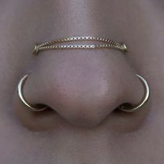 a close up view of a nose ring