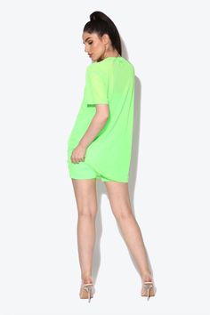 Catch eyes and turn heads this festival season in our Miami Neon Green Oversized Mesh T-shirt. Get summer ready with our oversized tee it’s the perfect poolside cover up during the day or add biker shorts and heels for a neon evening look. Designed in London for KARIZMAFabric: MeshLength: 77cm Gentle dry clean or gentle hand wash cold water and hang to dry. Model is 5 ft 7 and wears a size small.Please use our size guide for body measurements when purchasing, our garments run true to size. Oversized Summer T-shirt, Oversized Athleisure T-shirt For Summer, Short Beachwear Tops For Summer, Sporty Green Beach Tops, Green Sporty Top For Beach Season, Sporty Green Tops For Beach Season, Oversized Trendy Summer Top, Relaxed Fit Short Beachwear Tops, Oversized Trendy Top For Summer