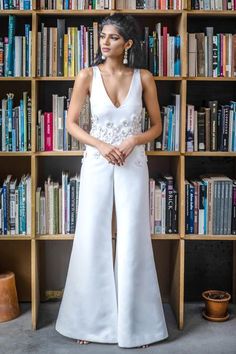 A modern white matte satin jumpsuit with sequin flowers placed at random! Perfect for a bridal shower, wedding event, or a warm summer day! Crop Tops Lehenga, White Sequin Skirt, Gold Embroidered Dress, Lehenga Skirts, Sequin Flowers, Black Dress Jacket, Bride Elegant, Flower Places, Eyelet Shirt