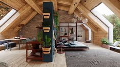 an attic with wood floors and exposed ceiling, large bed in the center surrounded by potted plants