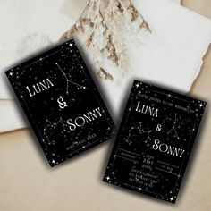 two black and white wedding cards with stars on them