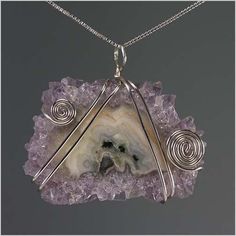 This is nature at its finest! This stunning amethyst stalactite has been delicately wrapped with sterling silver wire and placed on a 16 " sterling silver box chain. The amethyst stalactite measures approximately 1.25 " in height by 1.50 " in width and is a gorgeous statement piece. Other length box chains are available below for an additional cost. Wire Wrapped Stone Jewelry, Amethyst Stalactite, Wire Wrapping Stones, Silver Box, Box Chain, Silver Wire, Stone Jewelry, Wire Wrapped, Statement Pieces