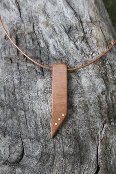 "A rare find, this beautiful and unique Irish Willow pendant has been made for you, or a loved one, in my studio on the West of Ireland. This minimalist pendant features a piece of Willow wood, recycled from musical instruments constructed by a local luthier. As a musician myself, I take enormous satisfaction in creating a necklace whose inherent wood has previously featured in a beautiful hand-made harp. The willow tree has a long history of symbolism rooted in spirituality and cultural traditi Brown Square Pendant Jewelry For Gift, Handmade Square Pendant Jewelry For Everyday, Handmade Pendant Jewelry For Anniversary Gift, Artisan Style Rectangular Pendant Necklace As Gift, Artisan Rectangular Pendant Necklace As A Gift, Handmade Brown Square Pendant Jewelry, Artisan Rectangular Pendant Necklace For Gift, Artisan Necklace With Rectangular Pendant As A Gift, Artisan Necklace With Square Pendant For Gift