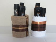 two toiletries wrapped in brown and white towels