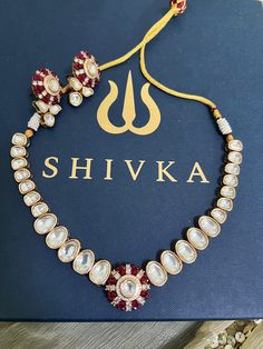 All our pieces are in stock and will be dispatched with in 24 to 48 hours of order. Orders received during the weekend will be dispatched on Monday New additions to our product line by our artisans. Be your own kind of beautiful. Simply a mark of royalty and elegance! You will definitely fall in love with the beautifully placed Kundan stones. One of our favorite picks for the wedding season 2022❤️ The gorgeous statement earrings add to the royalty of the stunning necklace. The necklace comes wit Indian Kundan Jewellery, Elephant Bangle, Stone Necklace Set, Necklace Set Indian, Bridal Necklace Set, Light Weight Jewelry, Kundan Necklace, Kundan Necklaces