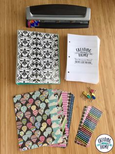 the supplies needed to make a diy scrapbook are laid out on a table