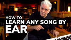 an older man sitting at a keyboard with the words how to learn any song by ear