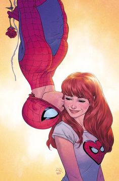 a woman with red hair and blue eyes is hugging a spider - man