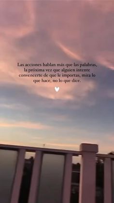 a person standing on a bridge with a sky background and the words la accciones haban mas e las palabra