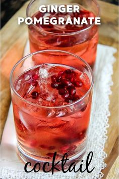 two glasses filled with cranberry pomegranate cocktail