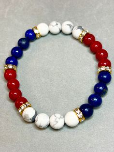 7  inches stretchable. Howlite, red jasper and lapis Jasper And Lapis, Red Jasper, Adjustable Bracelet, Red White And Blue, Stretch Bracelet, Jewelry Ideas, Stretch Bracelets, Lapis Lazuli, Beaded Jewelry