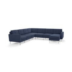 a blue sectional couch with gold legs on an isolated white background, it's facing the camera