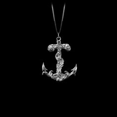 Elevate your style with our gold Anchor pendant. This solid gold necklace showcases exquisite craftsmanship, symbolizing stability and strength. The anchor pendant is more than just jewelry; it's a fine representation of nautical themes and maritime symbolism. PENDANT INFORMATIONThis pendant is made of real, solid gold.• Made in USA• Material: 14k or 18k solid gold• Finish: polished• Height: 1.5" (38 mm) x Width: 1.1" (27 mm)• Pendant weight: approx. 6 grams (14k)• Bail: fits up to 4 mm chains• Symbolic Silver Anchor Jewelry, Classic Silver Anchor Jewelry, Sterling Silver Engraved Anchor Necklace, Silver Necklace With Engraved Anchor Pendant, Elegant Yellow Gold Anchor-shaped Necklaces, Anchor Pendant, Solid Gold Necklace, The Anchor, Solid Gold Chains