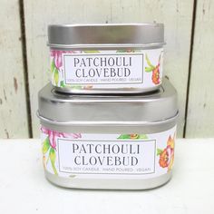 two tins of patchouli cloverbud candles