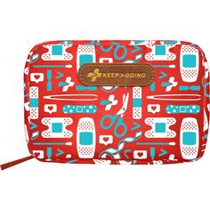 a red and blue toiletries bag with scissors on it