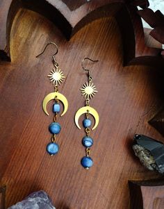 Bohemian Moon Phase Dangle Earrings, Bohemian Moon Shaped Brass Jewelry, Adjustable Crescent Spiritual Earrings, Bohemian Moon Phase Earrings For Festivals, Bohemian Moonstone Moon Earrings, Moon Phase Drop Earrings For Festival, Adjustable Bohemian Moonstone Earrings, Bohemian Blue Crystal Earrings, Bohemian Blue Moon Shaped Earrings