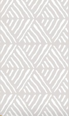 a gray and white wallpaper with an abstract design