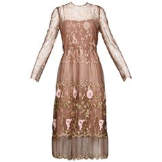 Stunning vintage taupe lace dress by Capriccio with embroidered flowers and a scalloped hem. Partially lined with rear zip and hook closure. There is no marked size, but the dress fits like a modern size medium. The bust measures up to 36", waist 28", hips 42", shoulders 15", sleeve length 25", and total length 49". Excellent vintage condition with no noted flaws. Brown Wedding Dresses, Jacket Png, Flower Lace Dress, Princess Closet, Flower Embroidered Dress, Dresses Brown, Taupe Dress, Ideal Wardrobe, Cocktail Dress Vintage