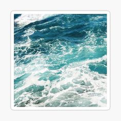 the ocean with waves crashing on it sticker