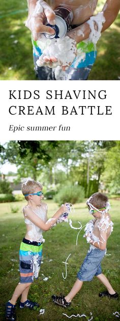 two young boys are playing with paper streamers on the grass in front of trees