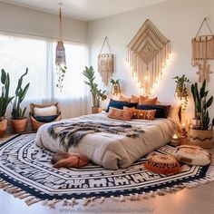 a large bed sitting in the middle of a room with lots of plants on it