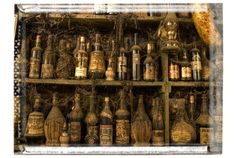 an old shelf filled with lots of bottles