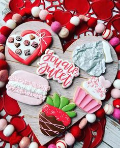 valentine's day cookies arranged in the shape of a heart