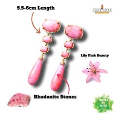 If you are looking for a bohemian-inspired jewelry piece that is inspired by nature and features pink lily flowers, the Lilly Pink Dangle Earrings from Treasure Jewelry may be just what you need . These earrings are handmade with semi-precious Rhodonite stones in fancy pink colors and measure around 5.5-6cm in size. The earrings are ... Pink Teardrop Earrings With Natural Stones, Pink Bohemian Gemstone Earrings, Bohemian Pink Gemstone Earrings, Unique Pink Gemstone Earrings, Pink Bohemian Hypoallergenic Earrings, Bohemian Pink Hypoallergenic Earrings, Bohemian Pink Long Drop Earrings, Pink Bohemian Hypoallergenic Jewelry, Pink Dangle Earrings