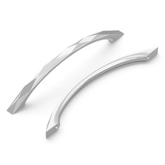 two curved metal objects on a white background