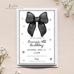 a birthday card with two black bows on it