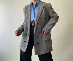 vintage pure fine wool double breasted blazer, plaid oversized blazer, preppy blazer  *size: fits s oversized, m relaxed  *measurements (centimeters) Shoulders 44 Bust 100 Inner sleeve 39 Length 76 *washing instructions: dry clean it  Please make sure you check all the measurements of the item before purchasing.  Vintage garment sizes are not the same as those of today. To ensure your best fit it's best you measure yourself or a similar item. The size listed it's an approximate size Classic Double-breasted Plaid Blazer, Double-breasted Plaid Blazer With Double Button Closure, Plaid Double-breasted Blazer For Business Casual, Formal Preppy Fall Blazer, Preppy Formal Fall Blazer, Fall Formal Preppy Blazer, Preppy Formal Blazer For Fall, Plaid Double-breasted Office Blazer, Plaid Double-breasted Blazer For Office