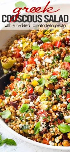 a close up of a plate of food with salad in the background and text overlay that reads greek couscous salad