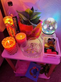 a table topped with candles and other items