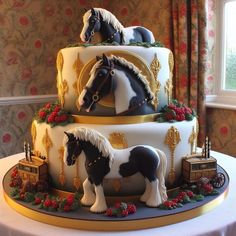 a three tiered cake decorated with horses