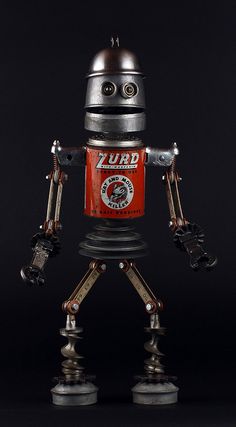 an old fashioned robot is posed in front of a black background with the words zurd on it