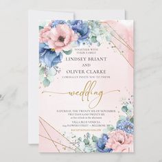 a wedding card with flowers and gold foil on the front, in pastel colors