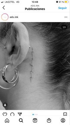 a person with ear piercings on their ears and behind them is an instagram page