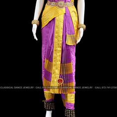 Design by Classical Dance Jewelry® ❥ Traditional Kuchipudi Dance costume for dancers, teachers, Gurus ❥ Material - art silk ❥ Style : Traditional pant costume ❥ ❥ ❥ ❥ size : See Below Measurements ❥ Size in Inchs ( all the measurements approximately 1 margin buffer) PANT MEASUREMENTS: Pant Length: 37-38 inch Pant Waist: 34-33 inch Pant Hip: 35-36 BLOUSE MEASUREMENTS: Blouse length: 15 inch Blouse Shoulder length: 15 -16 inch Blouse around Bust: 32-34 (extra margin) inch Blouse Lower Chest: 29-30 Bollywood Style Ceremonial Churidar For Navratri, Ceremonial Churidar With Traditional Drape For Festivals, Ceremonial Churidar With Pallu For Navratri, Gold Churidar For Ceremonial Festivals, Gold Churidar For Puja And Transitional Festivals, Traditional Patterned Sets For Dance Festivals, Traditional Dance Sets With Zari Work, Traditional Wear With Patterns For Dance Festivals, Traditional Wear With Traditional Patterns For Dance Festivals