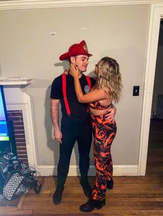 Couples costume, Halloween, Fire and Firefighter, costume idea, relationship Fireman Costume Mens, Fireman And Fire Couple Costume, Firefighter And Fire Couple Costume, Fire Fighter Couple Costume, Fire Costume Men, Fireman Costume