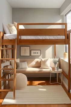 a living room with a couch and bunk bed in it's corner, next to a window