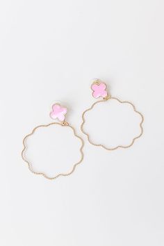 - Brunch ready style has arrived with these adorable earrings! - Gold colored metal material - Pink hued quatrefoil studs with post backs - Dangling twist textured scalloped hoops Pink Metal Drop Flower Earrings, Pink Hoop Metal Jewelry, Pink Small Hoop Metal Earrings, Pink Metal Earrings For Spring, Small Hoop Pink Metal Earrings, Pink Small Hoop Earrings In Metal, Pink Small Hoop Earrings In Cute Style, Cute Small Hoop Pink Jewelry, Pink Hoop Flower Earrings For Pierced Ears